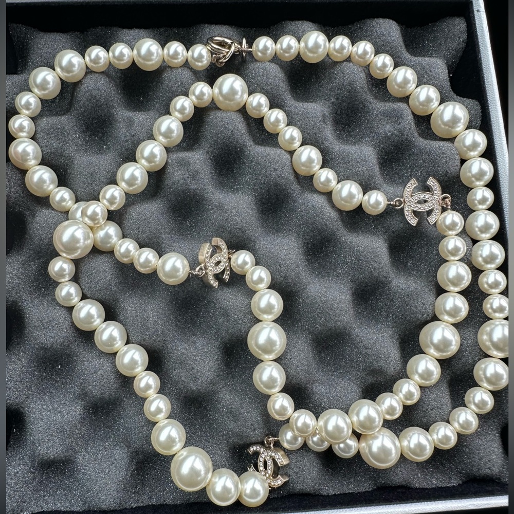 Authentic Chanel pearl necklace in original box and bag- great condition